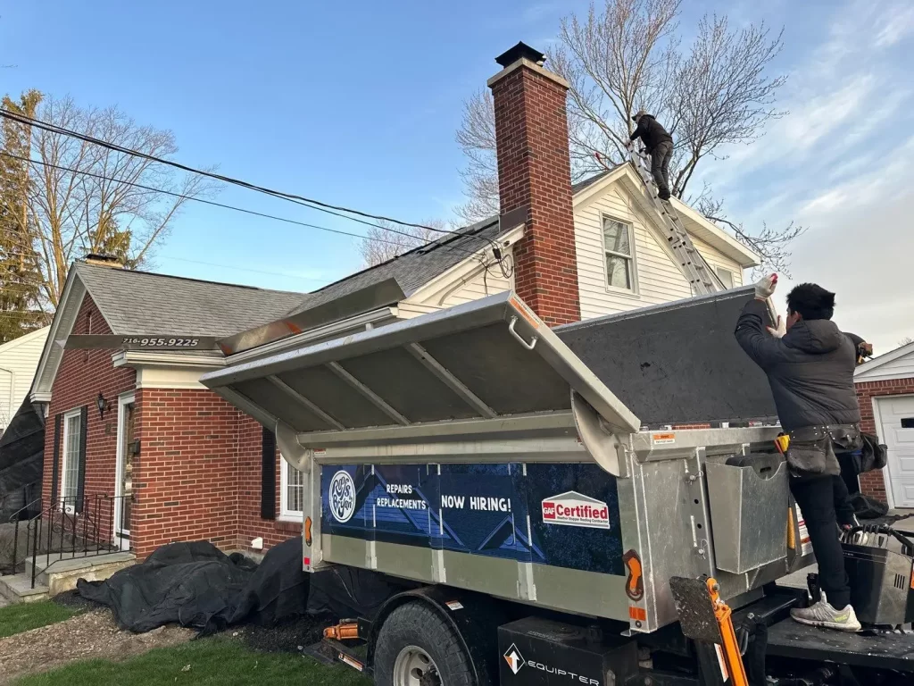 Roofs by Brian crew Working on roof repair
